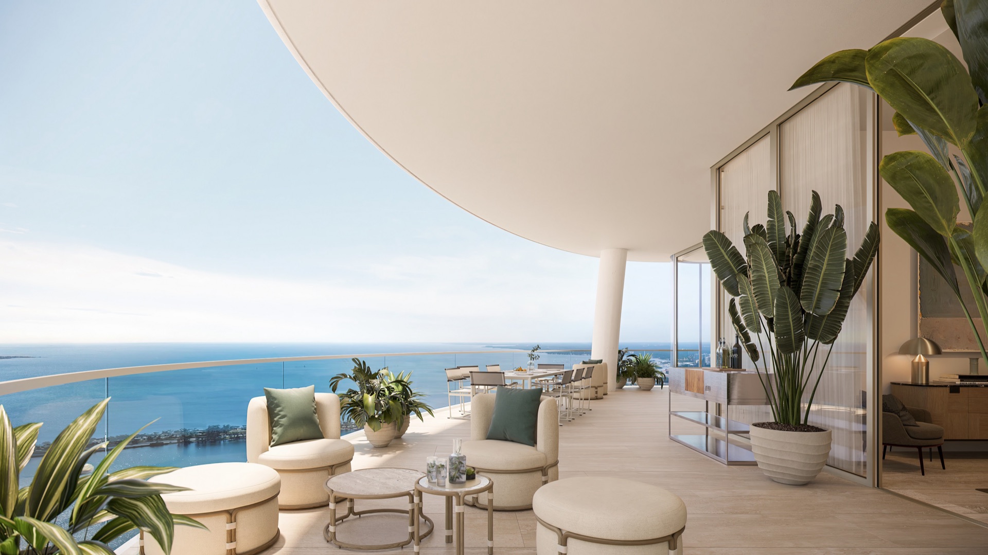 East-facing terrace overlooking Biscayne Bay, with summer kitchen for indoor-outdoor living.
