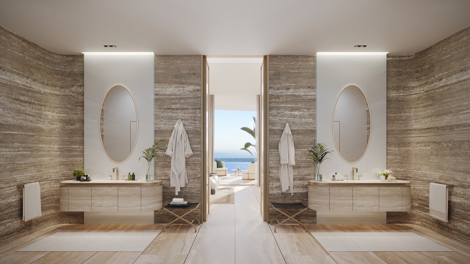 Primary bathroom with oversized travertine shower, free-standing sculptural bathtub, split vanities with Axor fixtures.