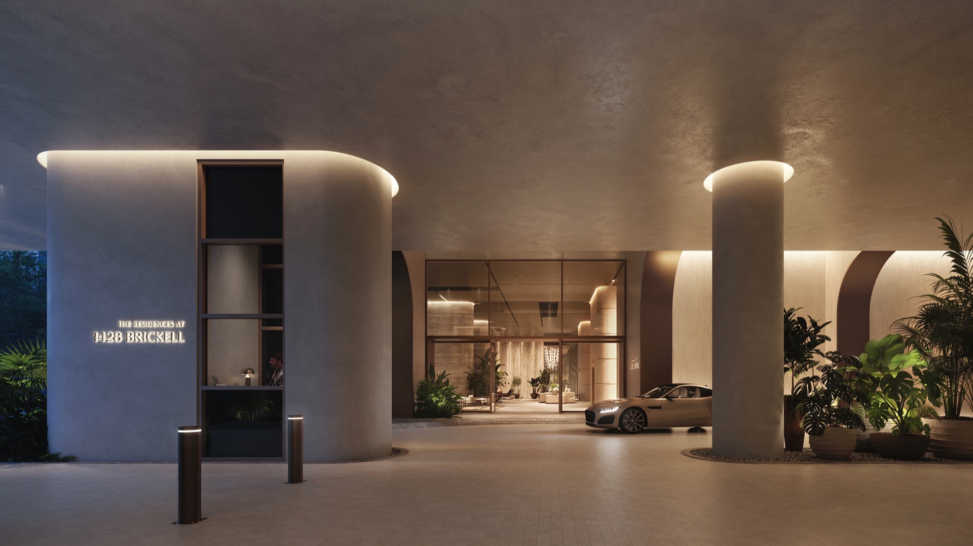 Porte-cochère arrival with lush tropical garden and 24/7 staffed guardhouse.